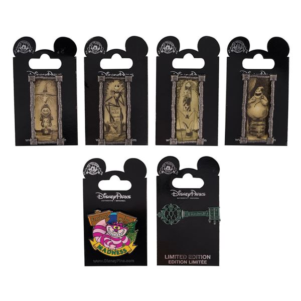 A Set of (6) Haunted Mansion & Disney Parks Pins.