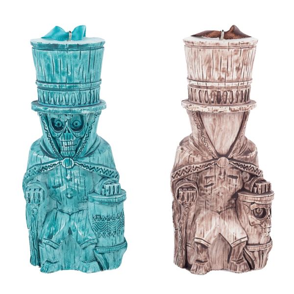 A Pair of Haunted Mansion Trader Sam's Tiki Ornaments.