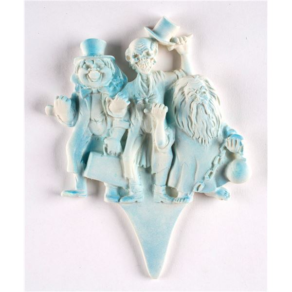 A Haunted Mansion Hitchhiking Ghosts Candy Topper.