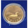 Image 1 : 1987 Proof Loonie Dollar. The first Proof Loonie. Ultra Heavy Cameo. Housed in its original RCM case