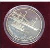 Image 1 : 1991 Specimen Silver Dollar. Commemorates the voyage of the steamship Frontenac. Housed in a black c