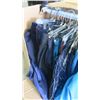 Image 3 : assorted size shirts and pants