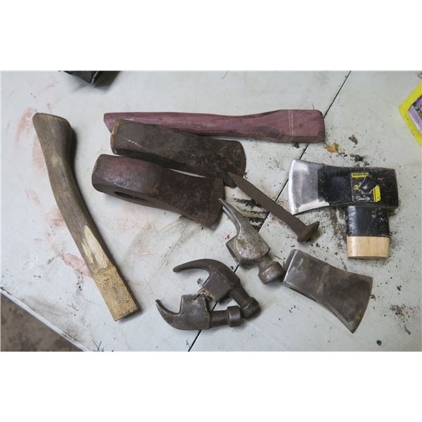 lot of hammer heads and axe heads
