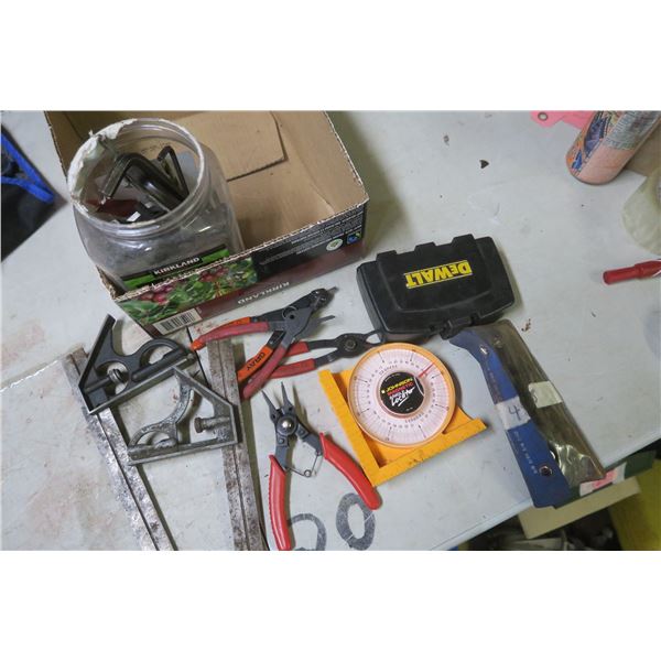 lot of allen keys, snap ring pliers, bits, etc.