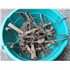 Image 2 : Tub of Leghold traps and parts
