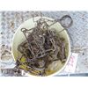 Image 1 : Pail of Conibear traps