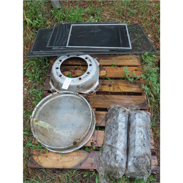 Pallet of heads, window screen and flywheel cover