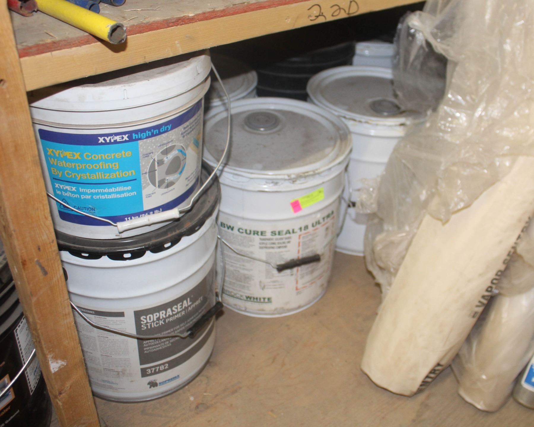 SHELF OF 5 GAL BUCKETS OF PRIMER AND SEALER