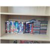 Image 1 : SHELF WITH CHRISTMAS VHS AND CDS (TELETUBBIES)