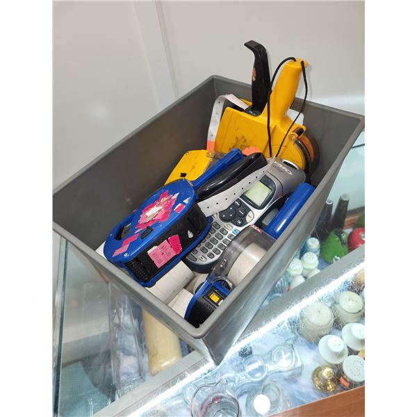 BIN OF PRICING GUNS, STICKERS AND LABEL MAKER