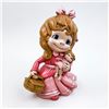 Image 1 : VINTAGE CERAMIC SMILING GIRL WITH DOLL SCULPTURE