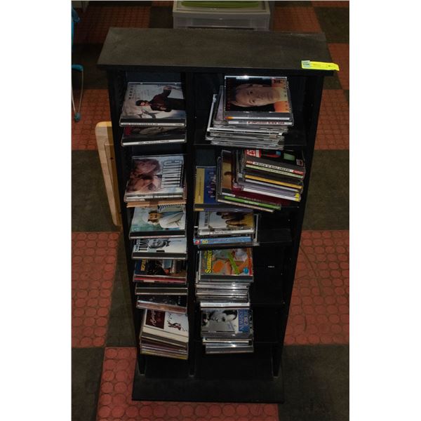 CD RACK WITH OVER 50 CDS