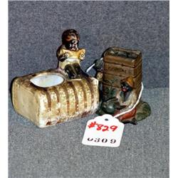 BLACKAMOOR MATCH HOLDERS, ONE PORCELAIN AND ONE ME