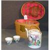 Image 1 : ORIENTAL PORCELAIN TEAPOT AND CUPS IN BASKET