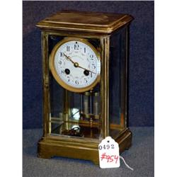 OVINGTON AND BROS CO BRASS AND GLASS CLOCK WITH PO