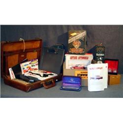 BRIEFCASE AND BOX WITH SOLDERING IRON, WHISKEY TIN