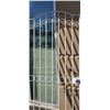 Image 2 : Metal security gate eighty inches by thirty seven inches