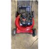 Image 2 : Briggs and Stratton gas powered lawn mower working