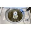 Image 2 : Whirlpool front load dryer and top load washer set working