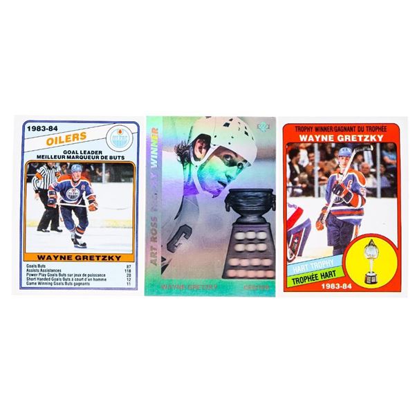 Group of 3 Wayne Gretzky Cards - 1983-84 Goal Leader, Hart Trophy, Art Ross Hologram.