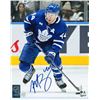 Image 1 : Rielly,M Signed 8x10 Unframed Maple Leafs Blue With Puck Action-V - Toronto Maple Leafs - 90-316