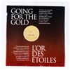 Image 2 : RCM Going for The Gold -Collector Album -22karat gold plated 1987 Loon Dollar Coin,Corner Block of S