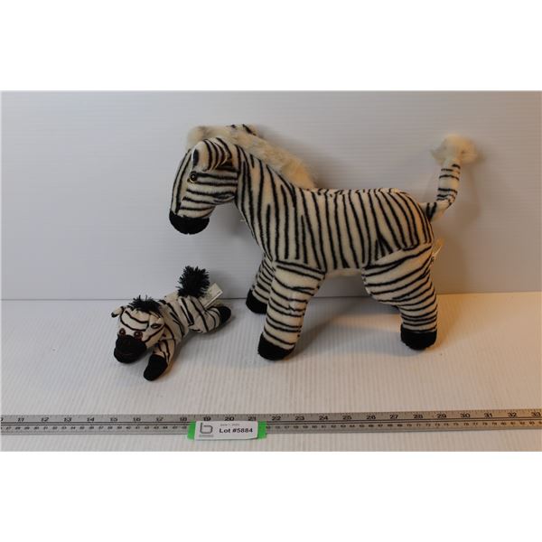(2) Stuffed Zebras (not real zebras that would be cruel)
