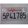 Image 2 : California and Montana License Plates