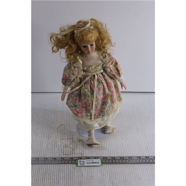 Porcelain Doll With Stand