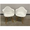 Image 1 : 2 White Eames Style Armchairs on Dowl Leg Bases (good used with some signs of wear/use)