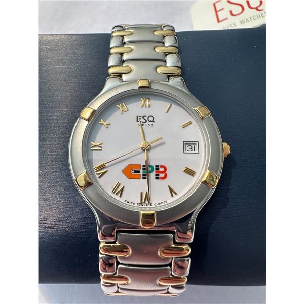 ESQ watch in appears to be new condition.  Not currently working.  w/ instruction book & bag