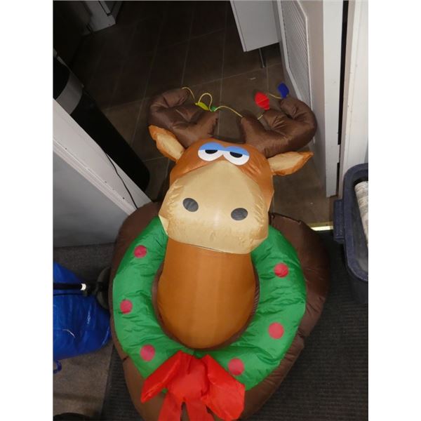 reindeer in wreath holiday decoration