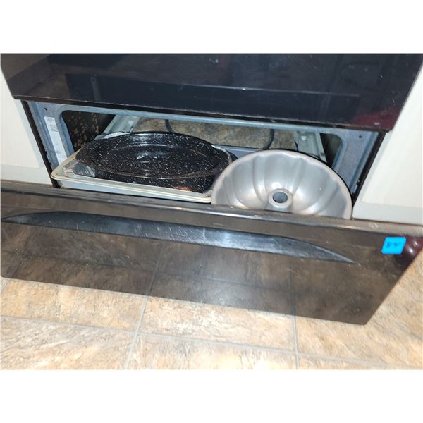 CONTENTS OF WARMING DRAWER IN STOVE (POTS AND PANS)