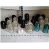 Image 1 : Large lot of insulators. Clear & blue Hemmingway. Greens & amber Dominion. Porcelain pieces made in 
