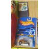 Image 3 : looney tunes matchbox cars, hot wheels car, and 2 diecast stock cars - all in original packaging