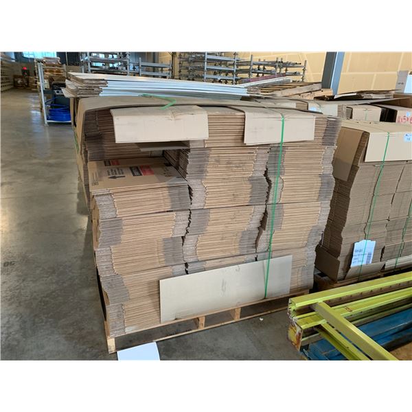 PALLET OF FLATTENED PACKAGING BOXES