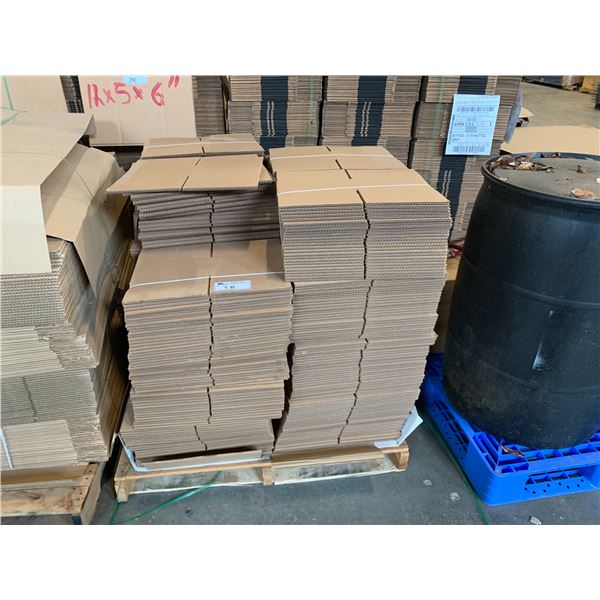 PALLET OF FLATTENED PACKAGING BOXES