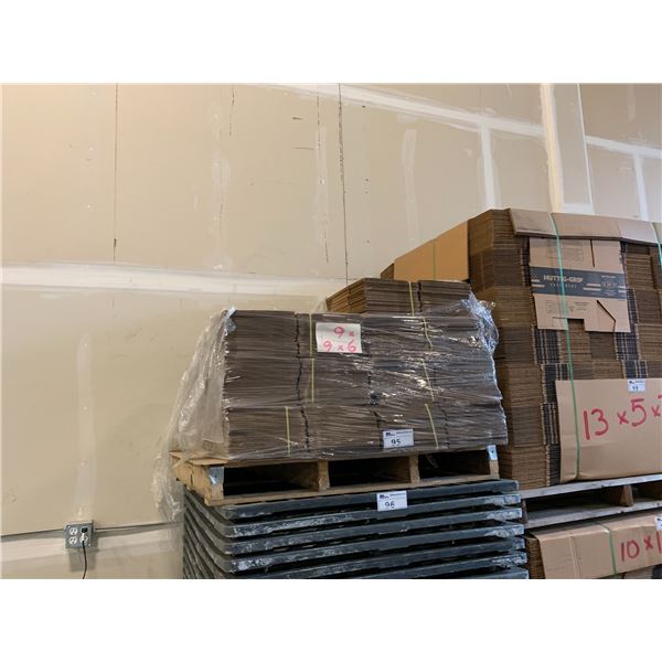 PALLET OF FLATTENED PACKAGING BOXES