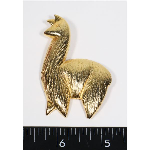 GOLD TONE LAMA BROOCH