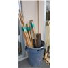 Image 1 : GARBAGE CAN WITH LONG TOOL HANDLES AND ROLL OF TAR PAPER