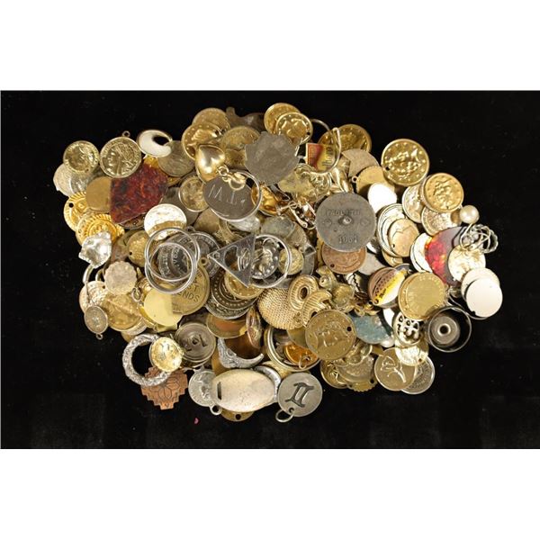 APPROX. 1 POUND OF METAL CHARMS, PENDANTS ETC...