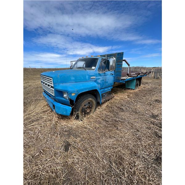600 Ford single axle, c/w Bale deck, propane - Runs but doesn’t want to start right now