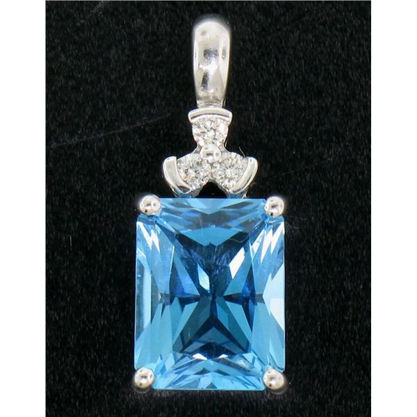 10K White Gold 4.06 ctw Rectangular Princess Cut Blue Topaz & 3 Diamond Pendant