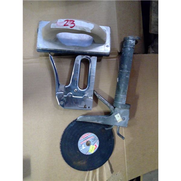 2 disks, stapler, caulking gun, drywall sander