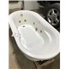 Image 1 : Hytec jet tub. (Working well when removed). L-65". W-35"