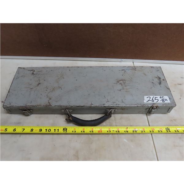 Metal tool box with assorted sockets and a wrench