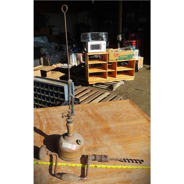 Antique hand drill and Coleman lamp