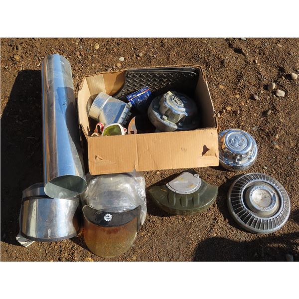 Box of Misc. Parts: hubcaps, facia, Sno Rider Face Masks, etc.