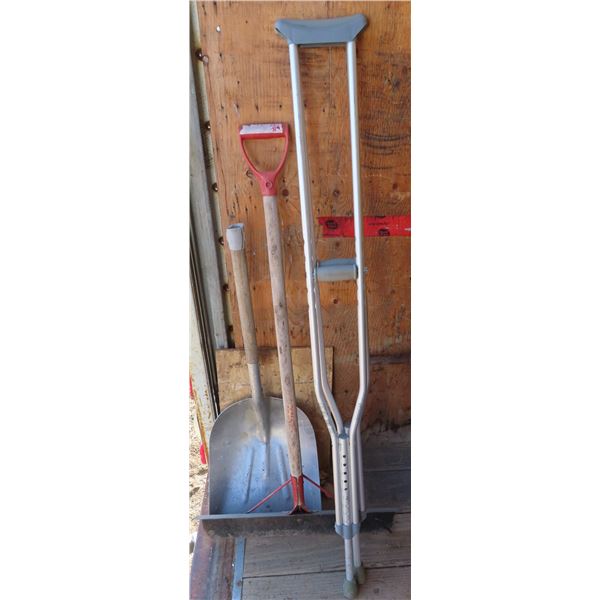 2 shovels and a pair of crutches