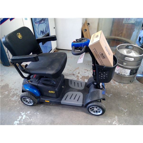 Golden Mobility Buzz around FX  hardly used includes key, charger and extra shrowds